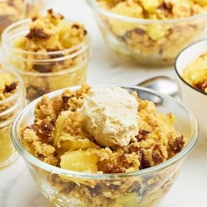 Pineapple Dump Cake served in a glass bowl.
