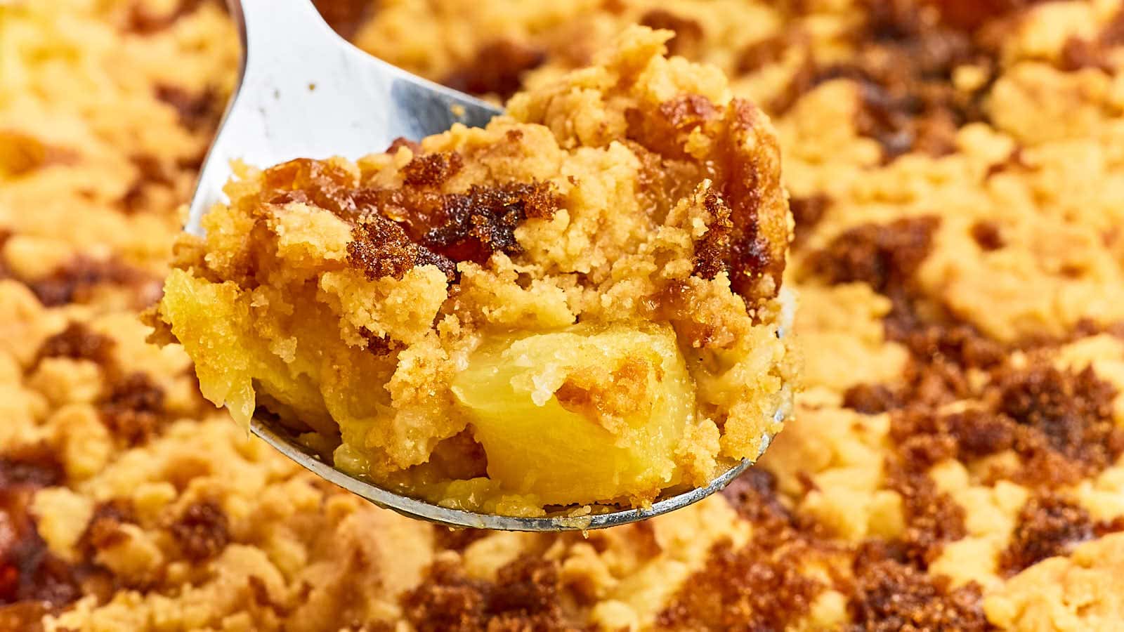 Indulge in a taste of the tropics with this simple and delicious Pineapple Dump Cake recipe, featuring layers of juicy pineapple, moist cake, and a buttery crumble topping that's sure to satisfy any sweet tooth. #cheerfulcook #pineappledumpcake #dumpcakerecipe #dessert #pineapple #4ingredients