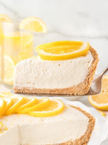 A slice of no-bake Lemon icebox pie on a serving plate.