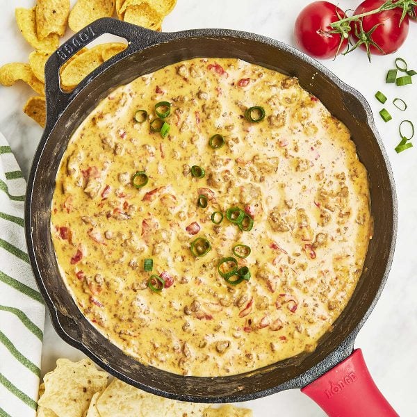 Closeup of spoonful creamy Rotel Dip.