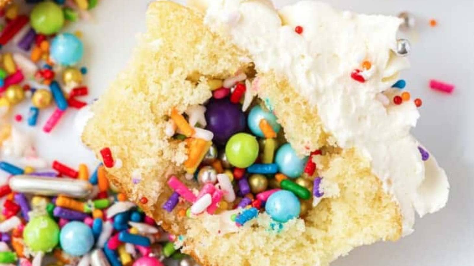 Fun Piñata Cupcakes recipe by Little Sunny Kitchen.