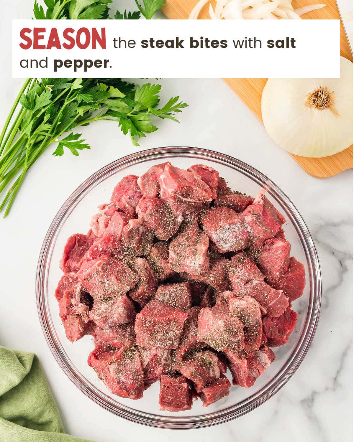 Sirloin seasoned with salt and pepper in a glass bowl for Crock Pot Steak Bites.