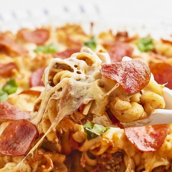Closeup of a scoop of a cheesy Pizza Casserole.