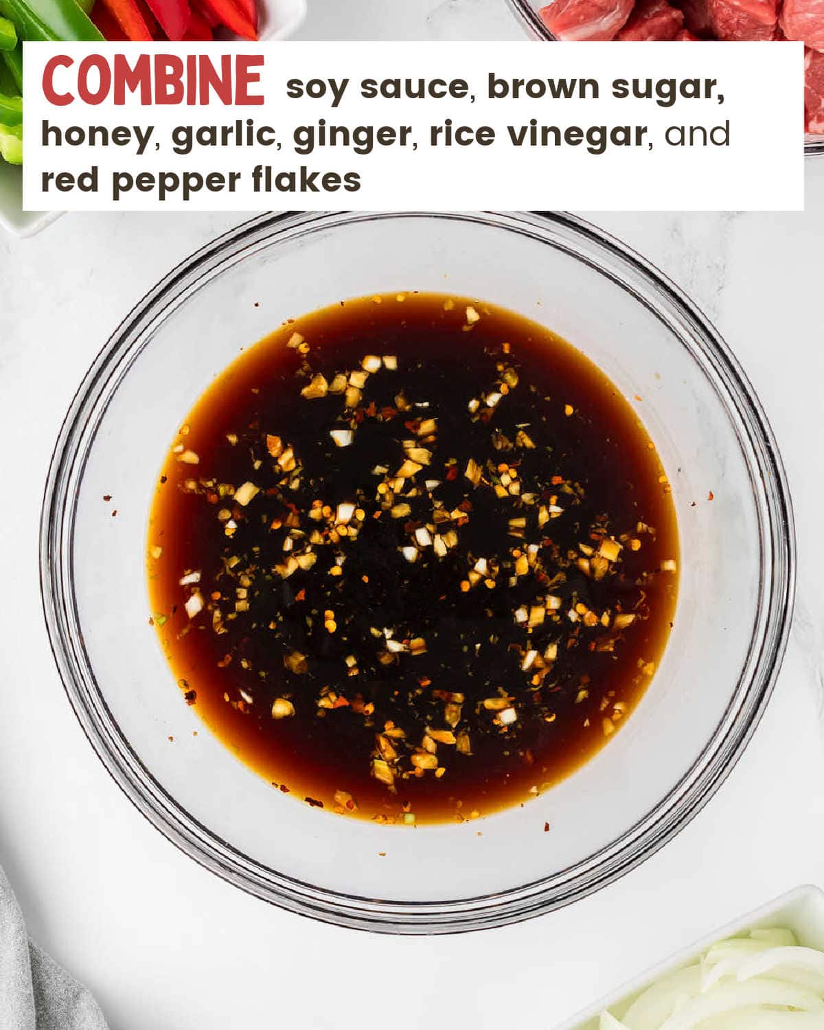 Soy sauce, brown sugar, honey, ginger, rice vinegar and other ingredients in a bowl.