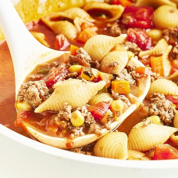 A ladle full of Sweet & Spicy Hamburger Soup.