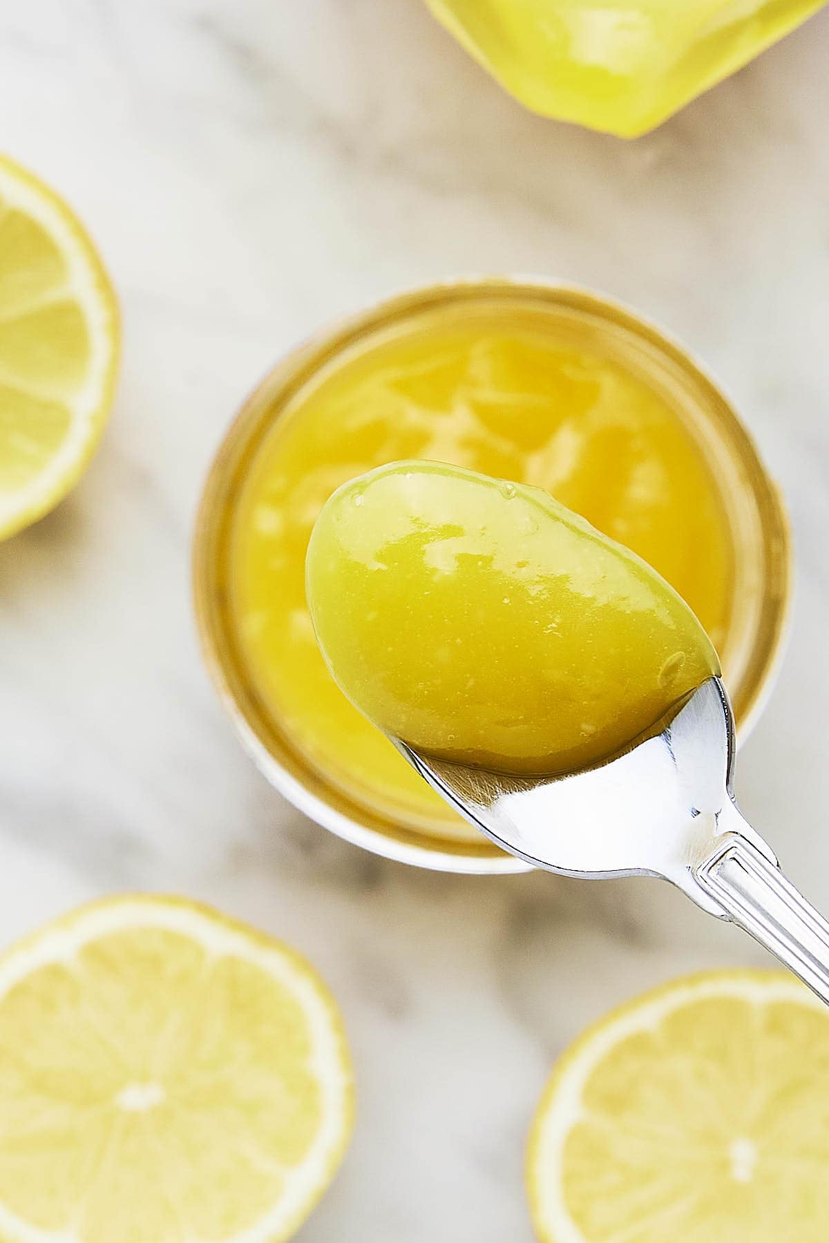 A spoonful of thick and rich homemade Lemon Curd.