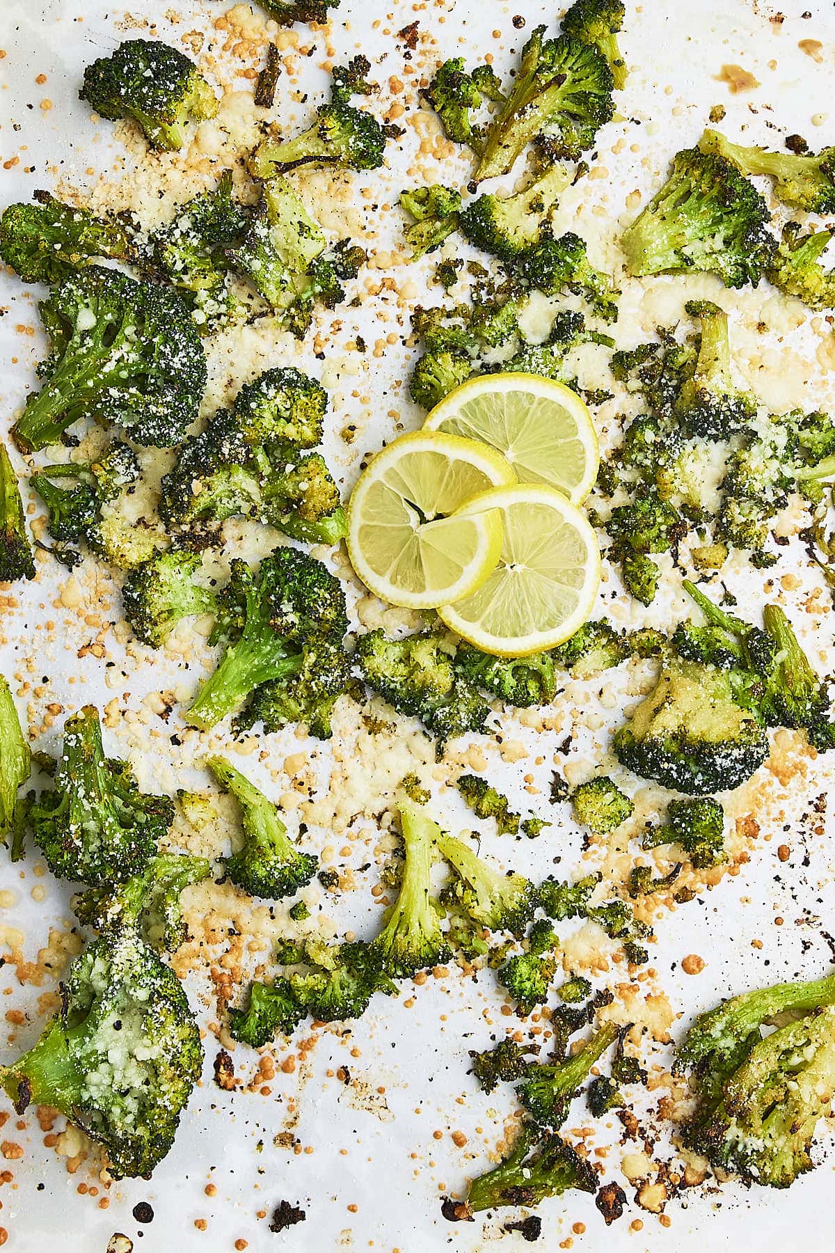 Freshly Roasted Frozen Broccoli served with sliced lemons.