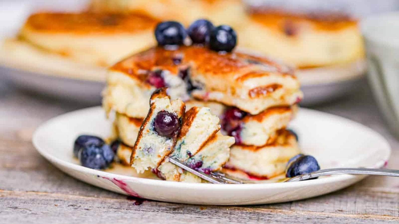 Greek Yogurt Blueberry Pancakes recipe by The Baking Chocolatess.