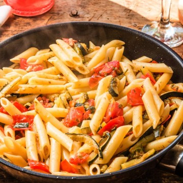 Healthy pasta in a cast iron skillet.