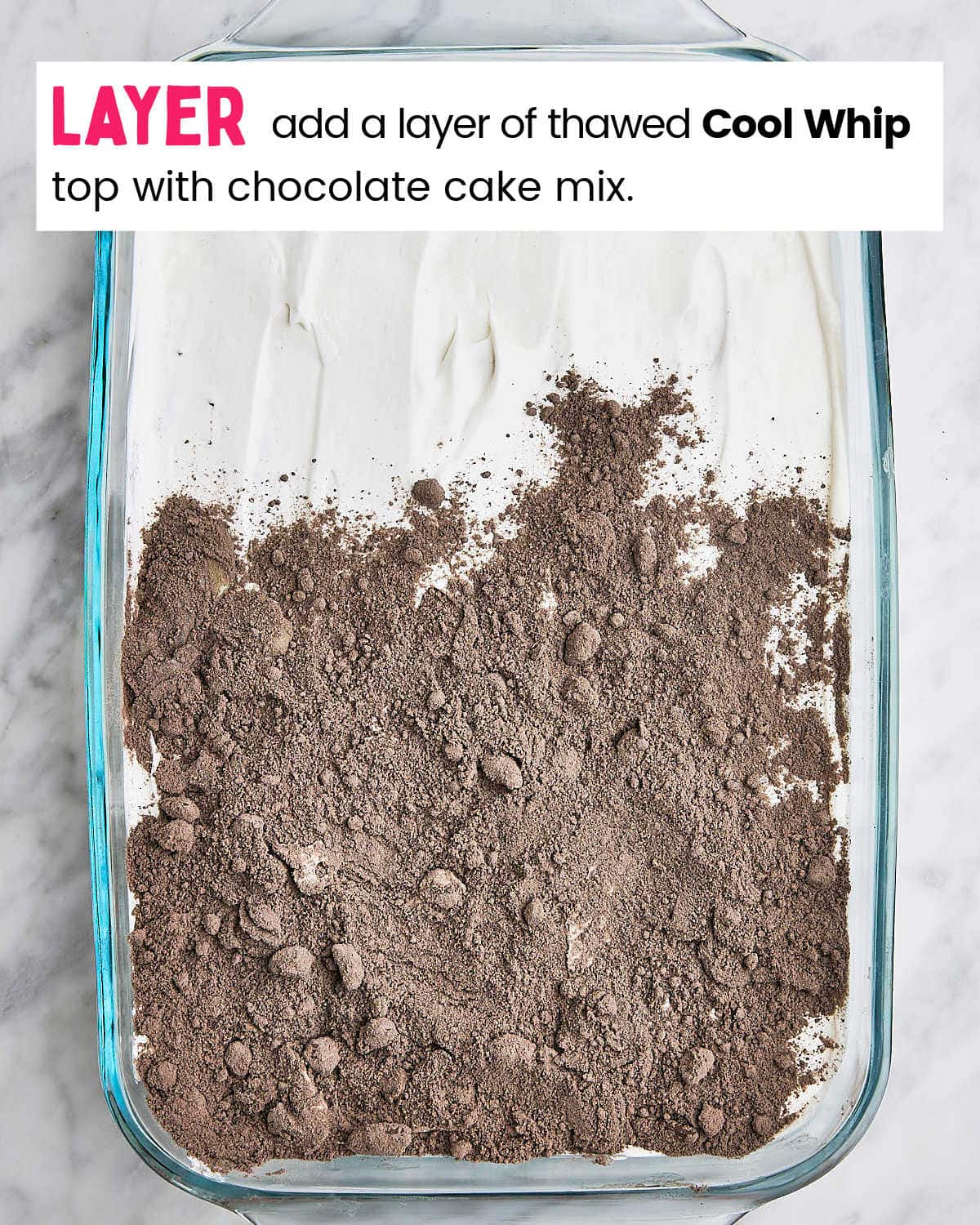 Process Step: Spread whipped topping over oreos and top with chocolate cake mix.