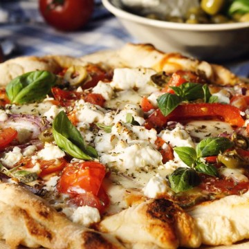 Closeup of a pita pizza.