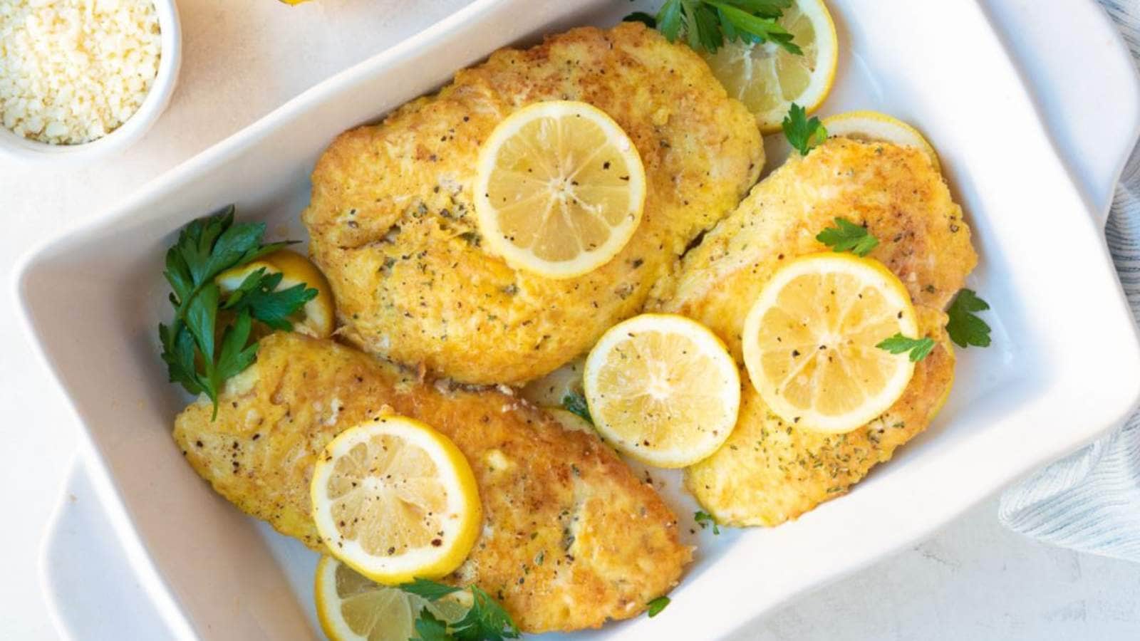 Easy Crusted Chicken Romano with Lemon Butter recipe by Delectable Food Life.
