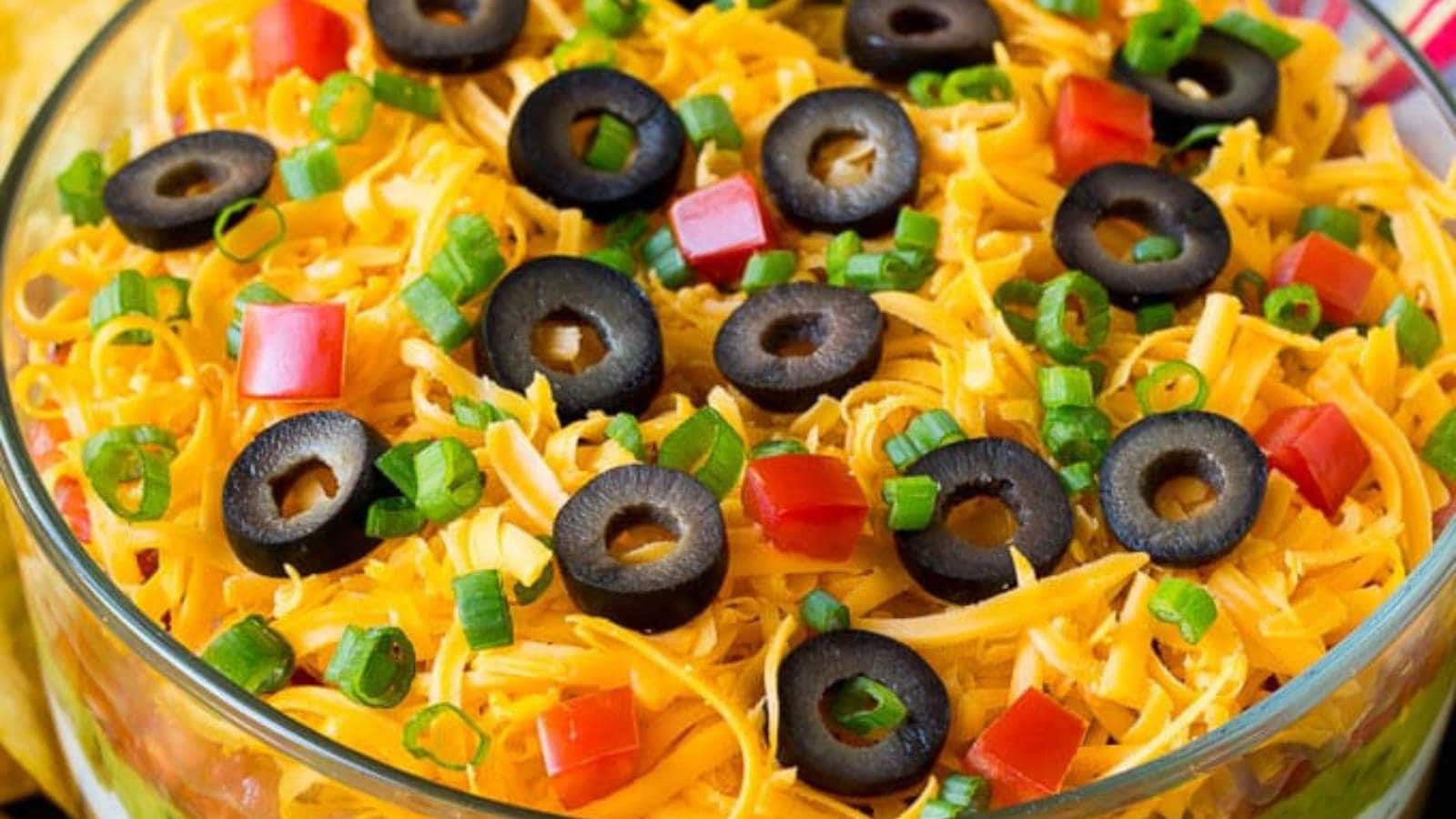 7 Layer Dip recipe by Dinner At The Zoo.