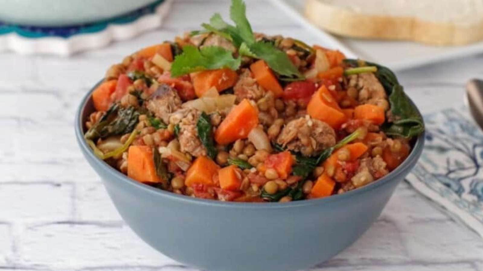 A bowl of lentil and sausage stew.