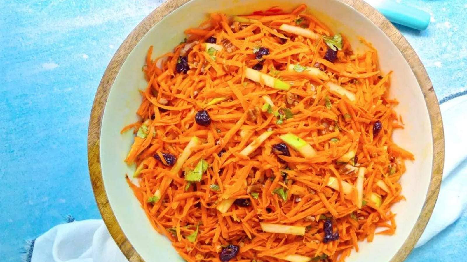 Carrot Slaw with Apples and Pecans recipe by Kid Tested Recipes.