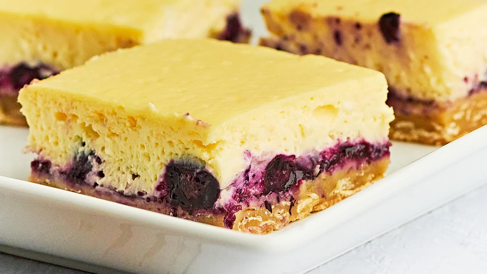 Blueberry Cheesecake Bars recipe by Cheerful Cook.