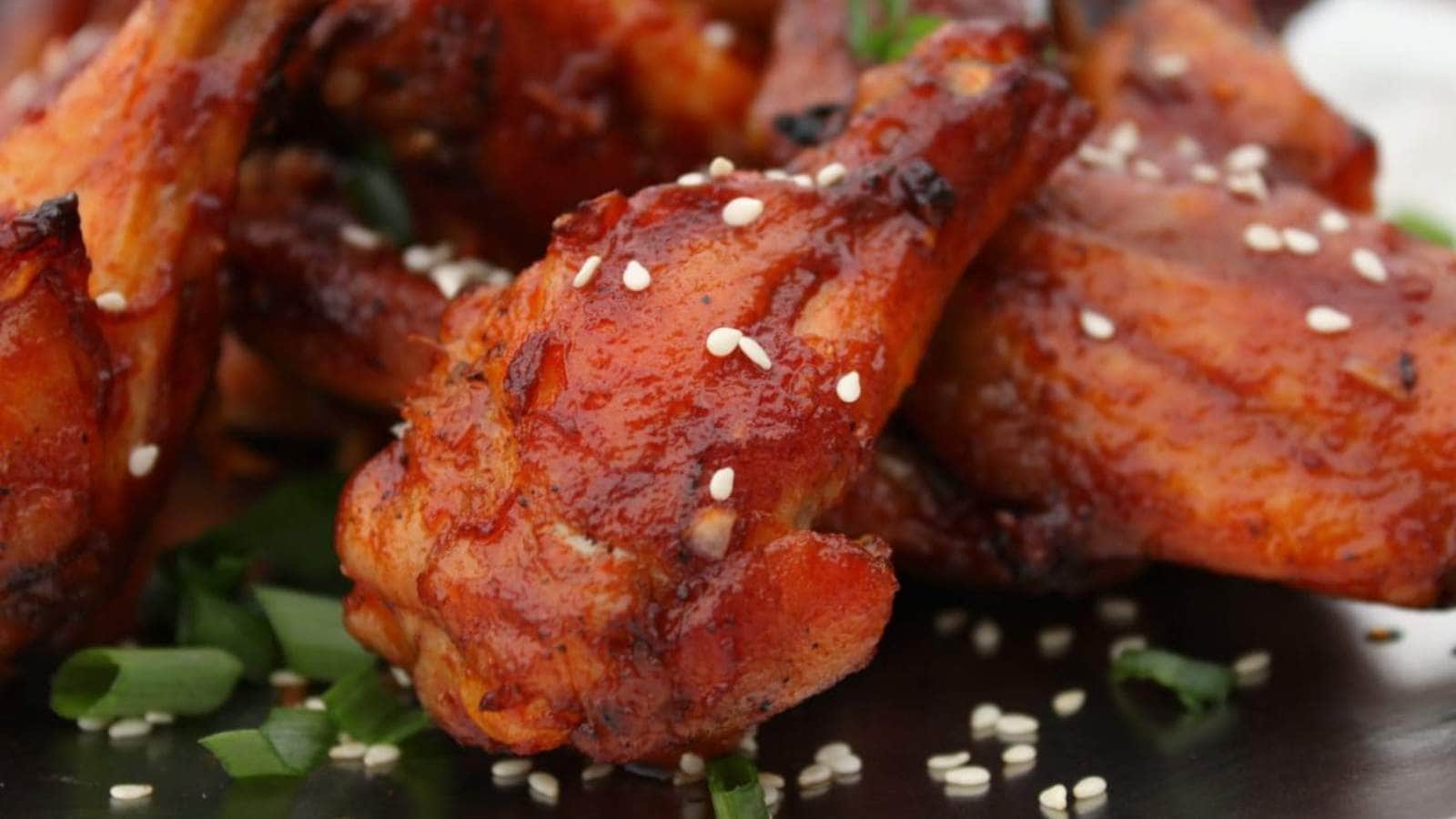 Sweet and Spicy Maple Gochujang Wings recipe by Dish In The Kitchen.
