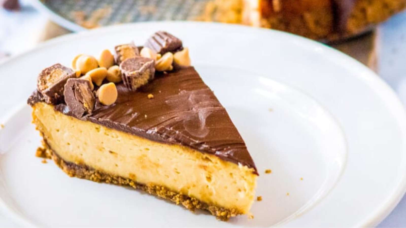Peanut Butter Cup Cheesecake recipe by Julie’s Eats and Treats.