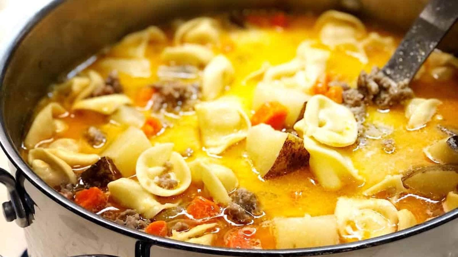One Pot Sausage Tortellini Soup recipe by Keeping it Simple.