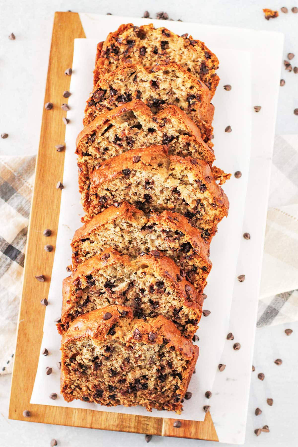 Sliced Chocolate Chip Banana Bread on a serving platter.