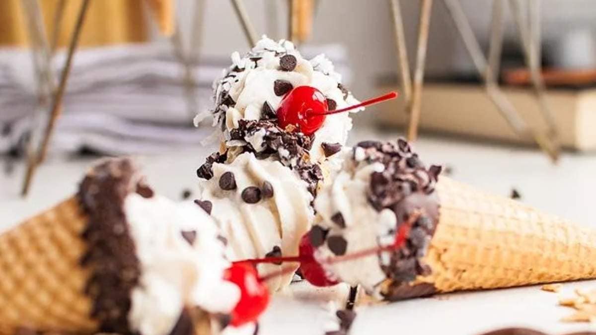 A shared roundup of mouthwatering ice cream cones adorned with chocolate chips and cherries, perfect for those seeking delicious no-bake desserts.
