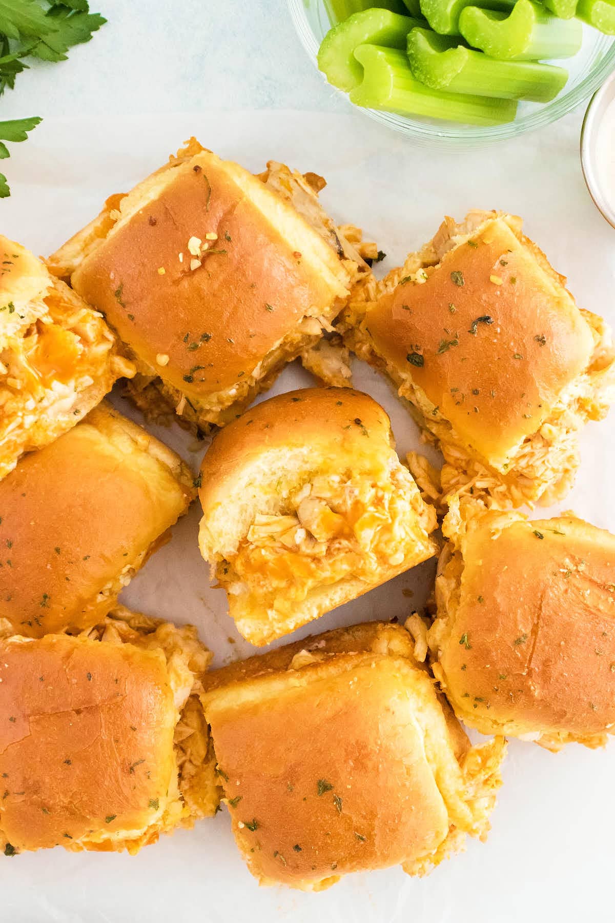 Cheesy Buffalo Chicken Sliders on a white plate.