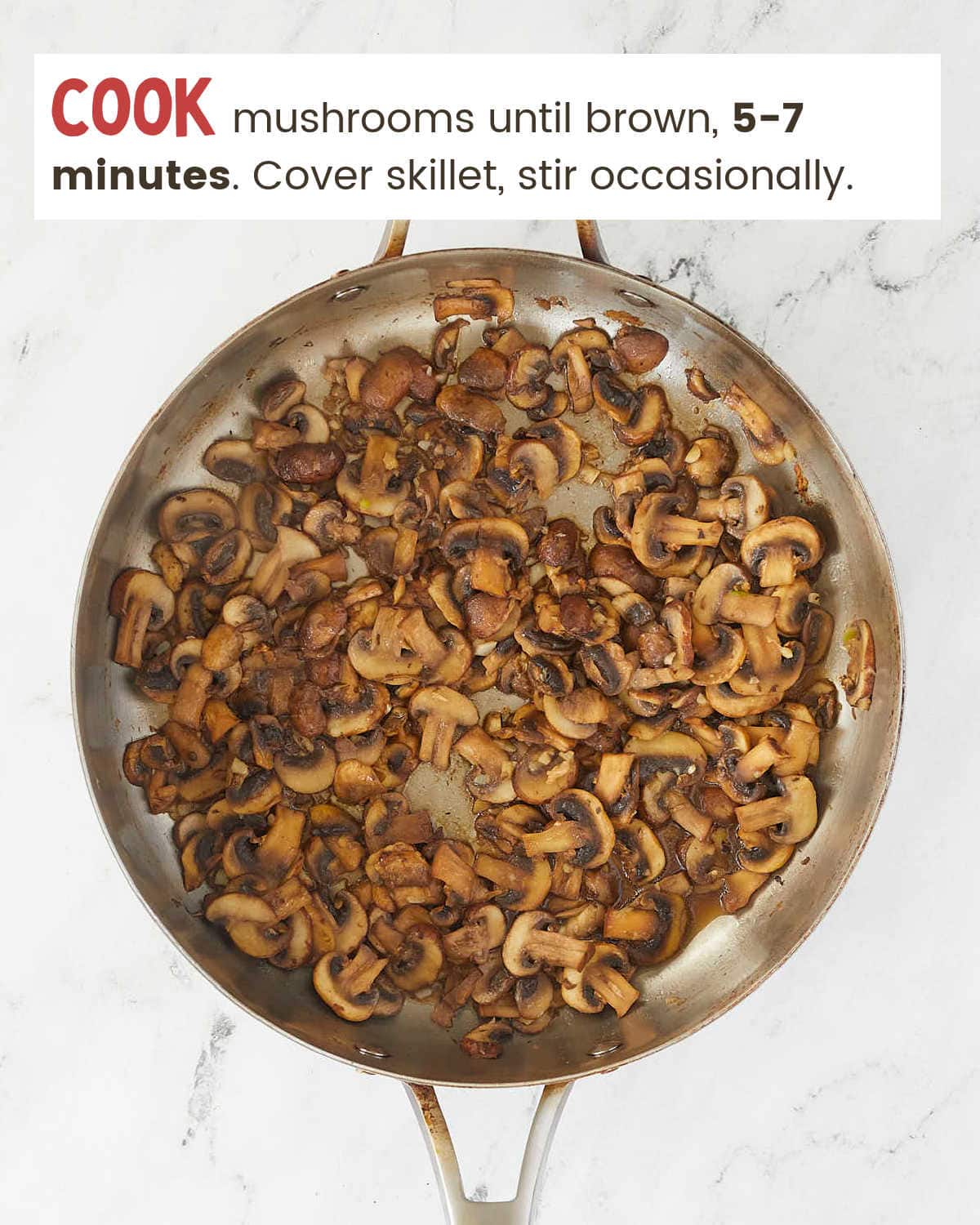 Browned mushrooms in pan for Chicken Marsala.