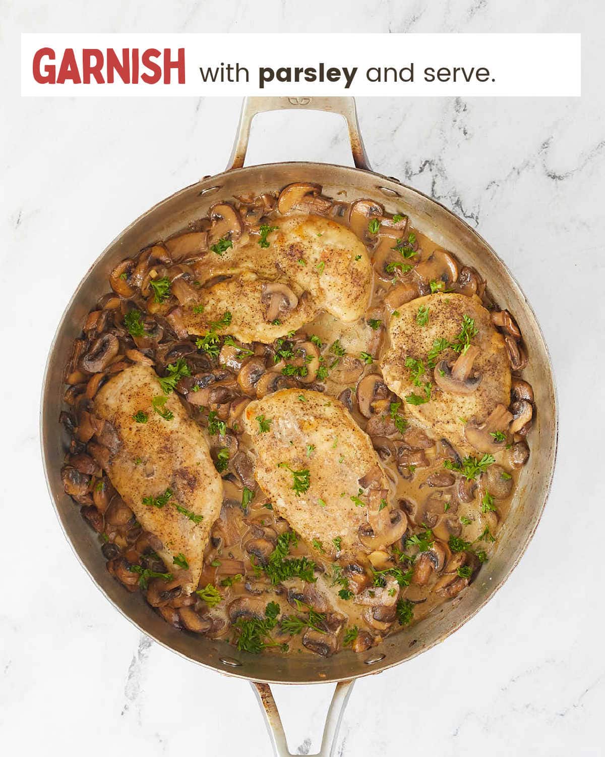 Garnishing Chicken Marsala with parsley