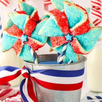 Patriotic pinwheel cookies in a bucket.