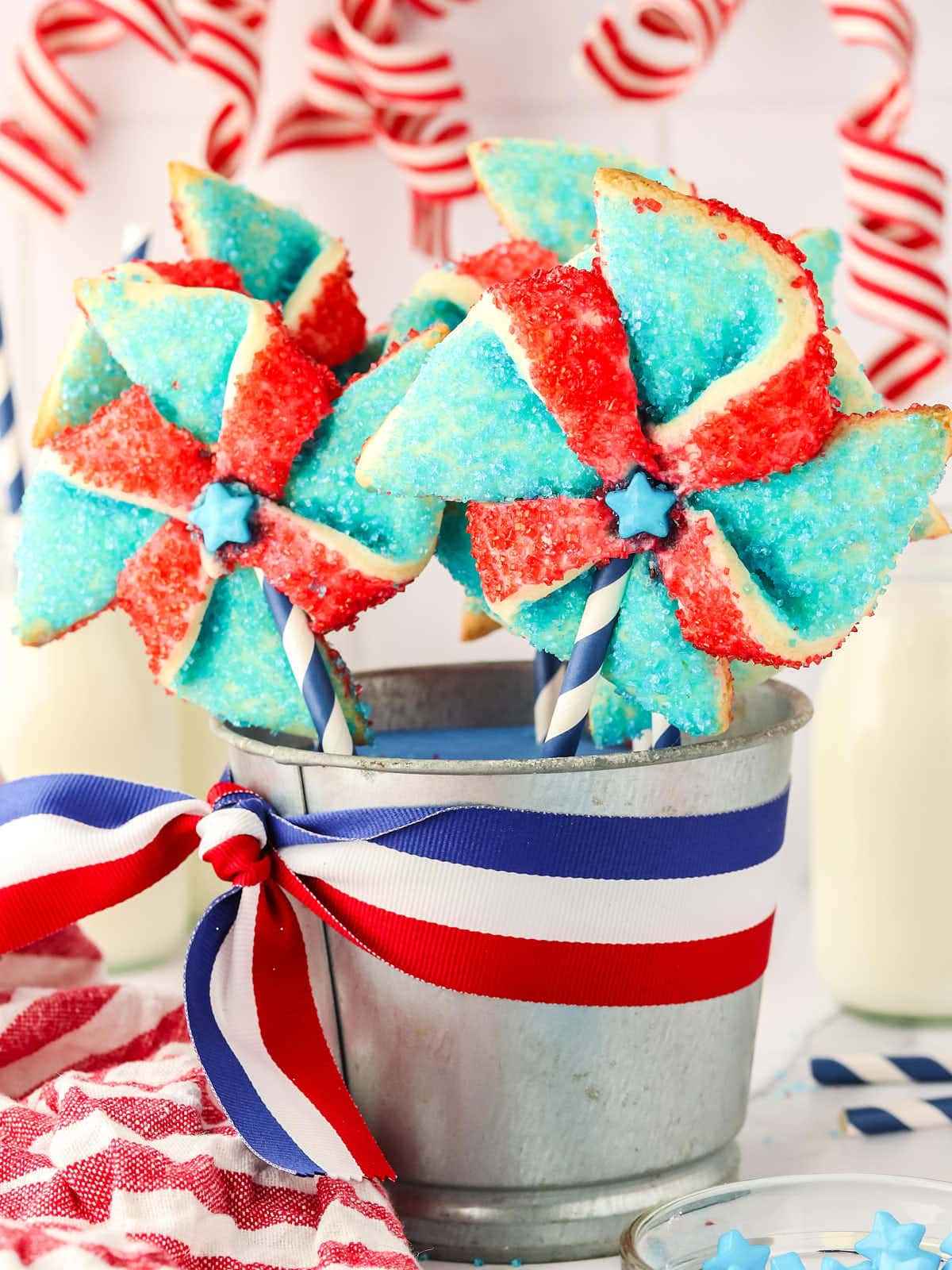Patriotic pinwheel cookies in a bucket.