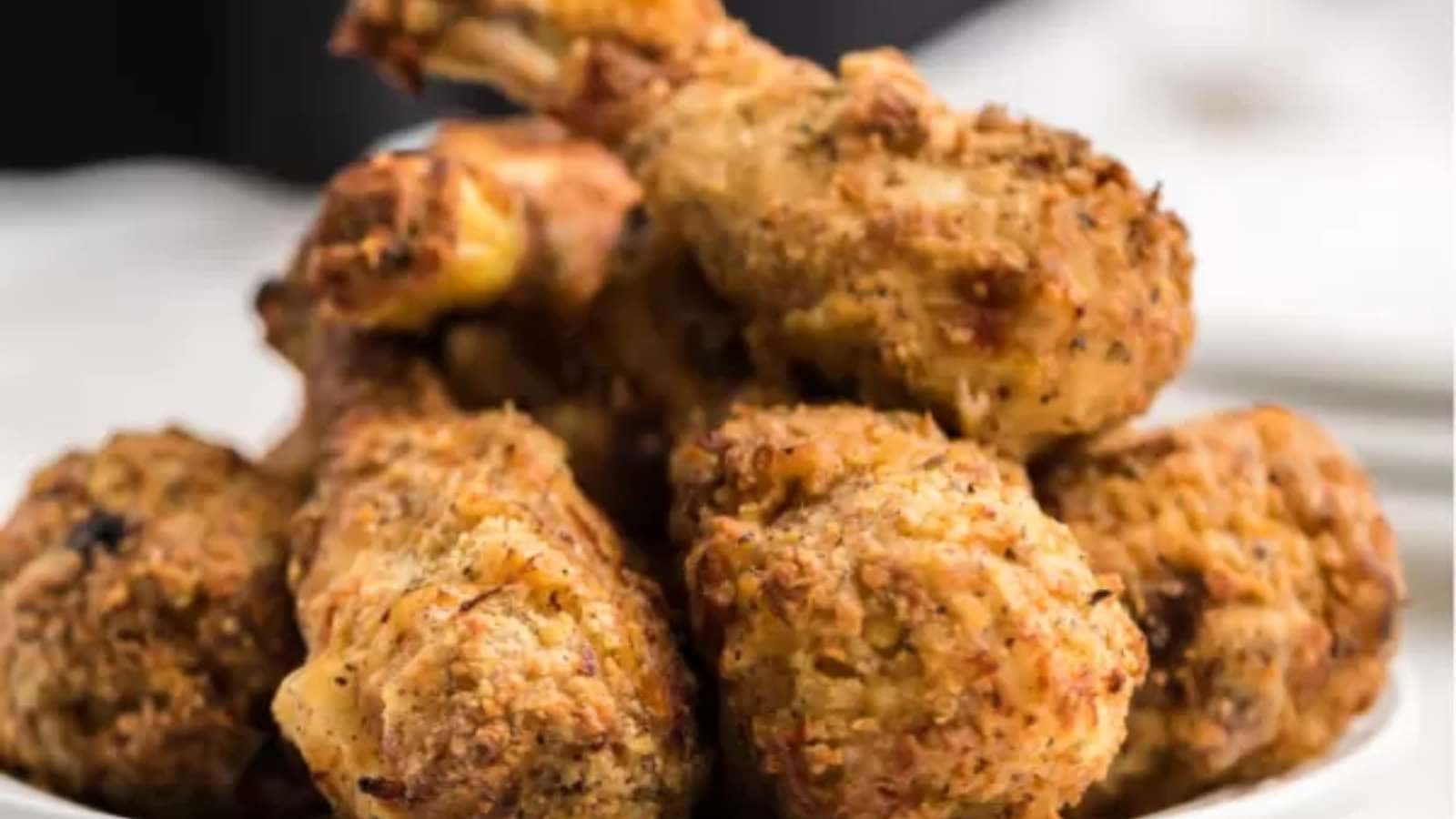 Chicken wings in a white bowl.