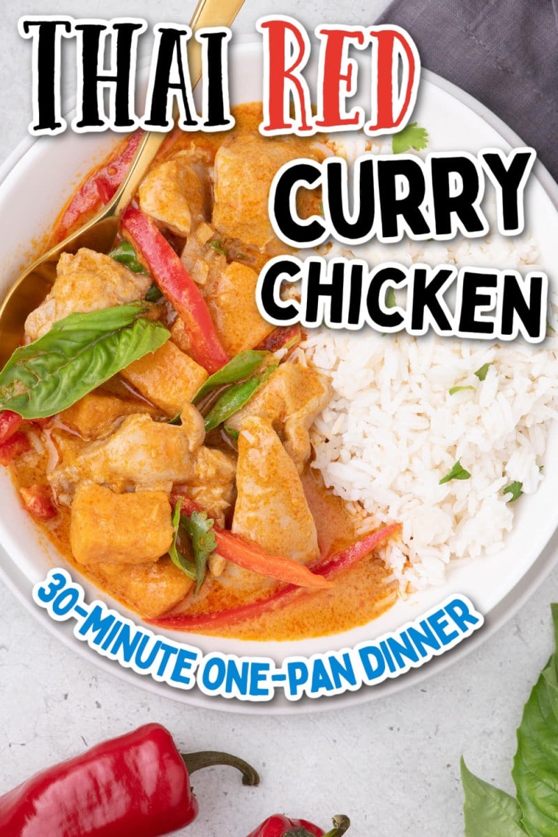 A bowl of Thai red curry chicken with a spoon.