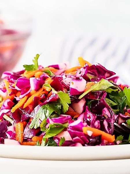 Cilantro Lime Coleslaw on a white plate.