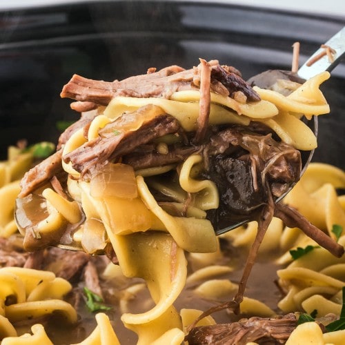 A spoonful of Crock Pot beef and noodles.