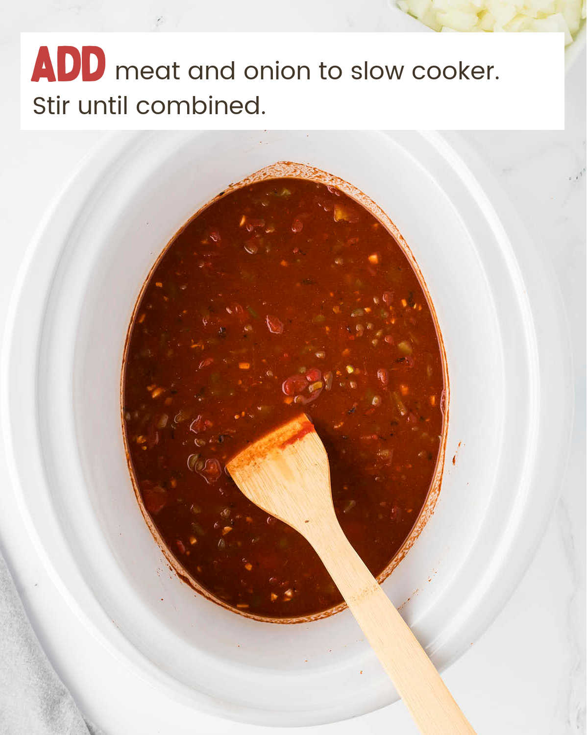 Add meat and onion to slow cooker for No Bean Chili