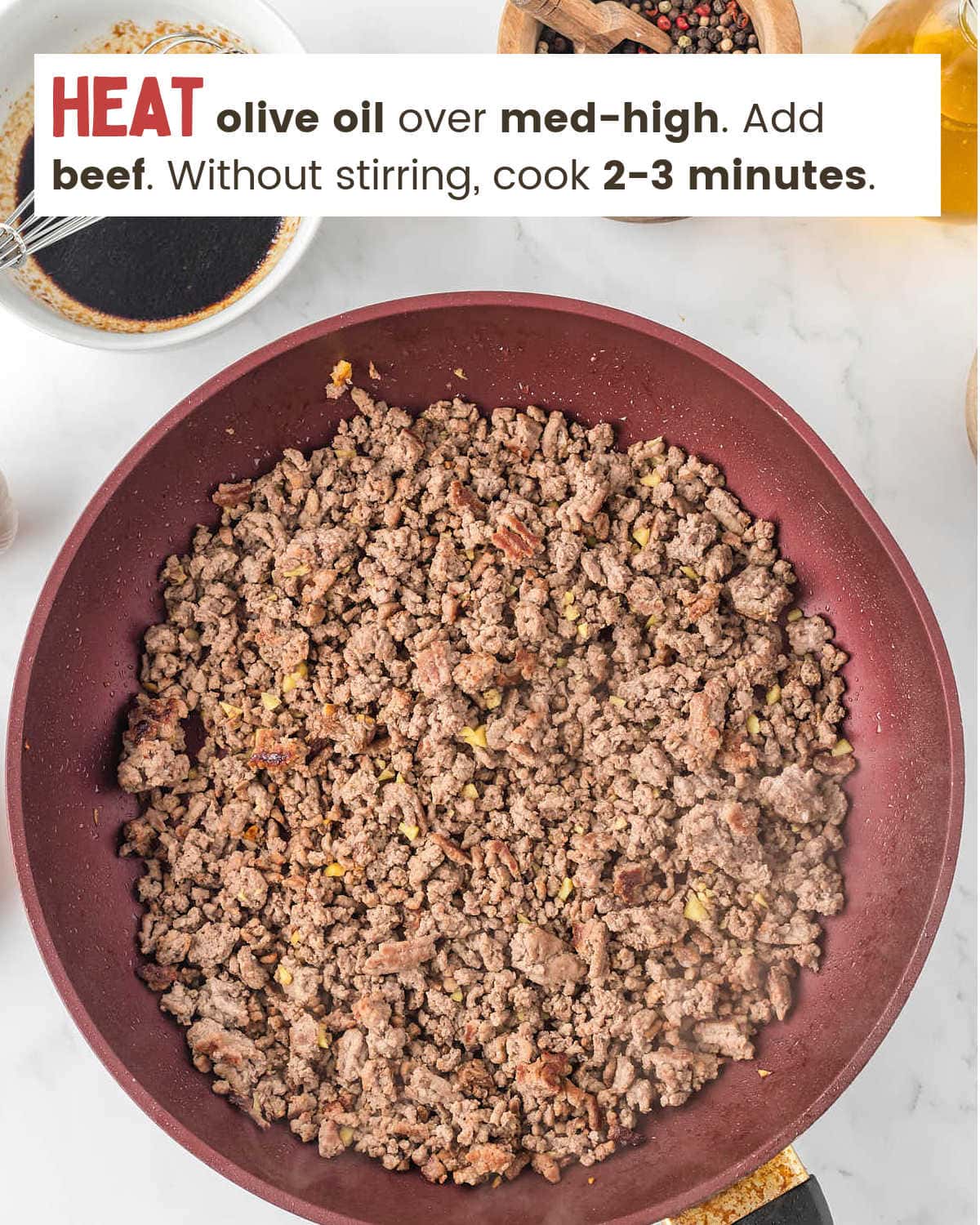 Ground beef in skillet for Korean Beef Bowl