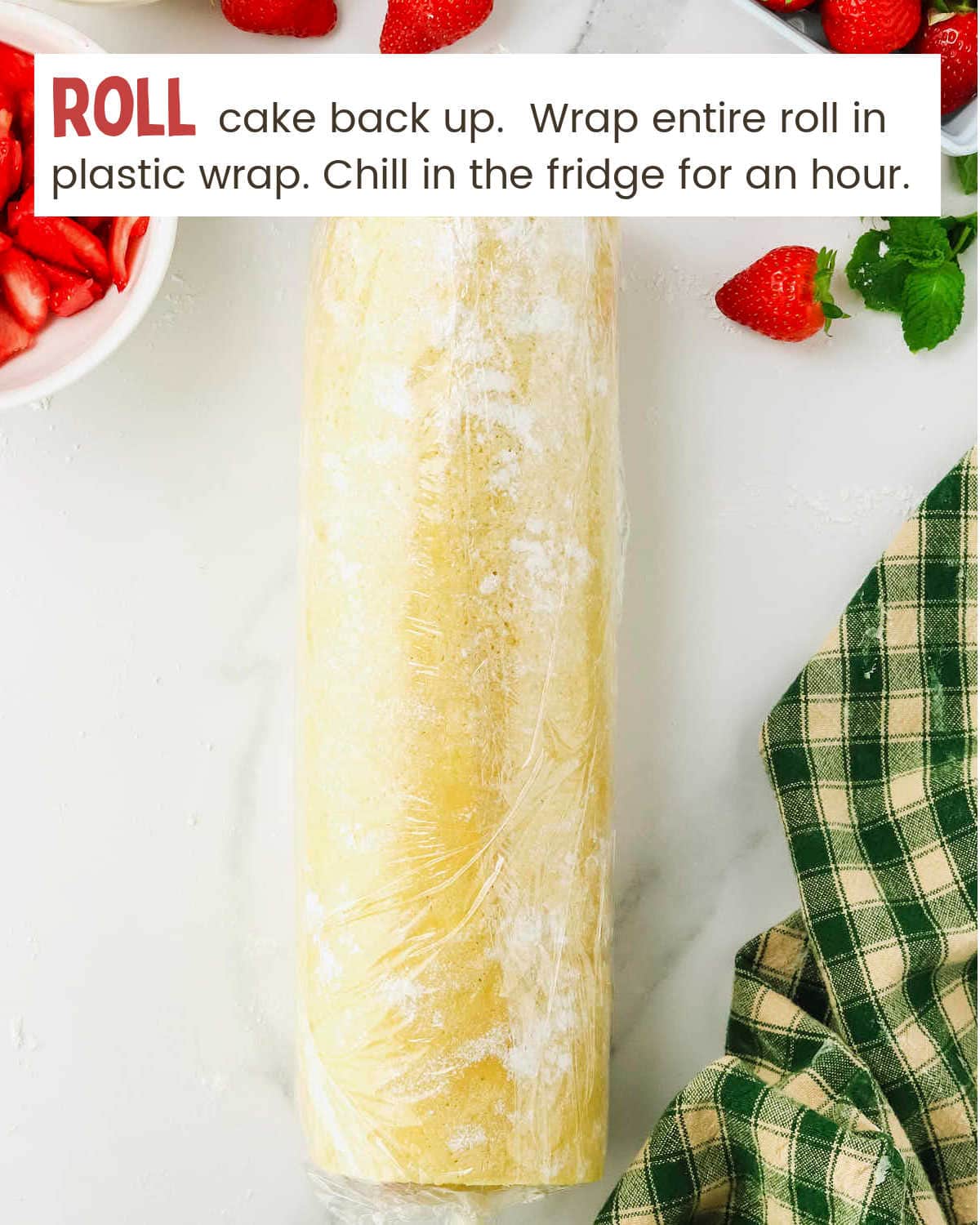 Roll Strawberry Shortcake Roll back up, wrap in plastic wrap, chill in the fridge for an hour.