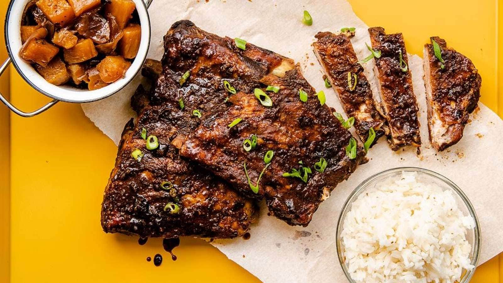 Bbq ribs and rice on a yellow background.