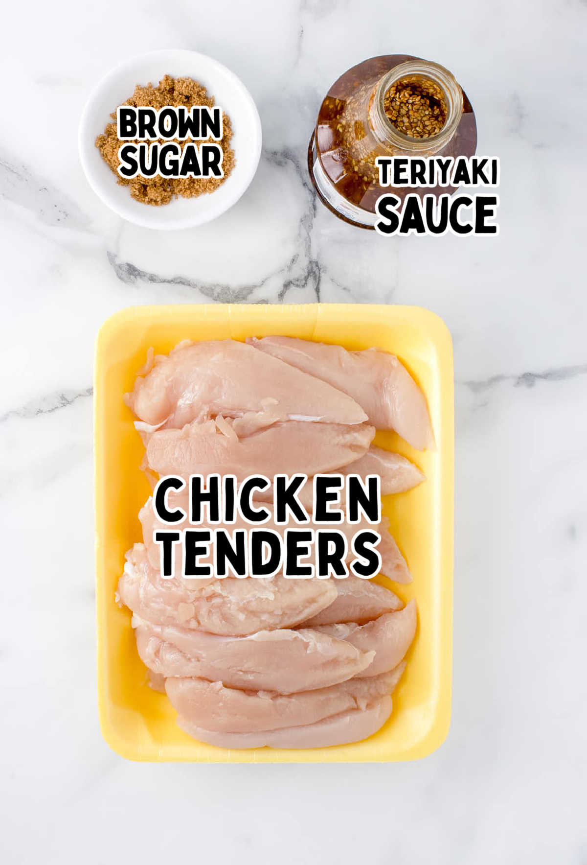 Ingredients for Air Fryer Teriyaki Chicken on a marble countertop.