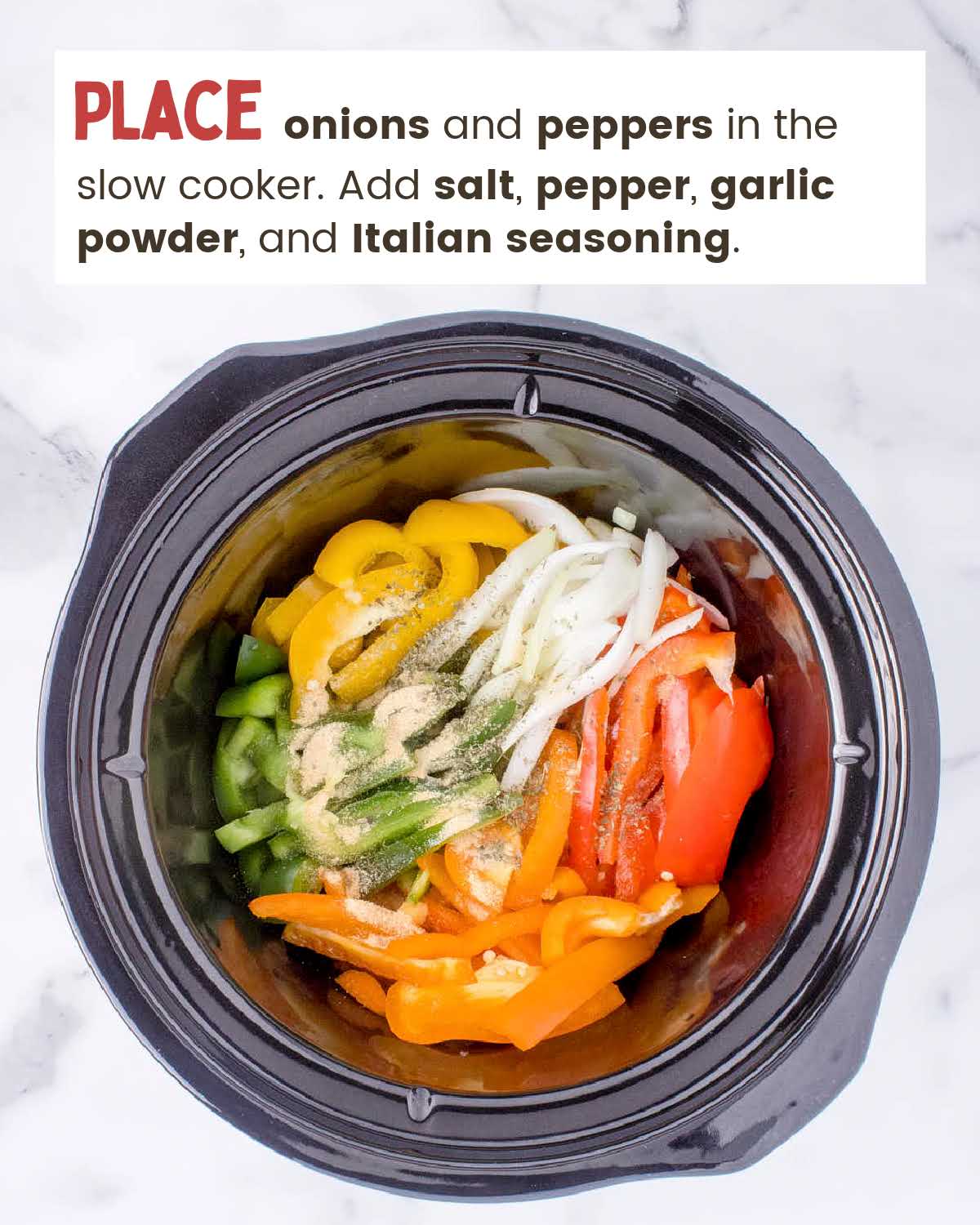 Sliced onions and bell peppers in a crockpot.