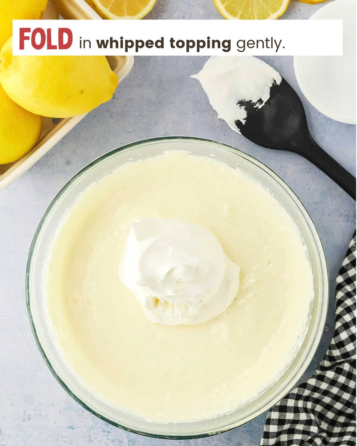 Adding whipped cream to lemonade for Frozen Lemonade Pie.