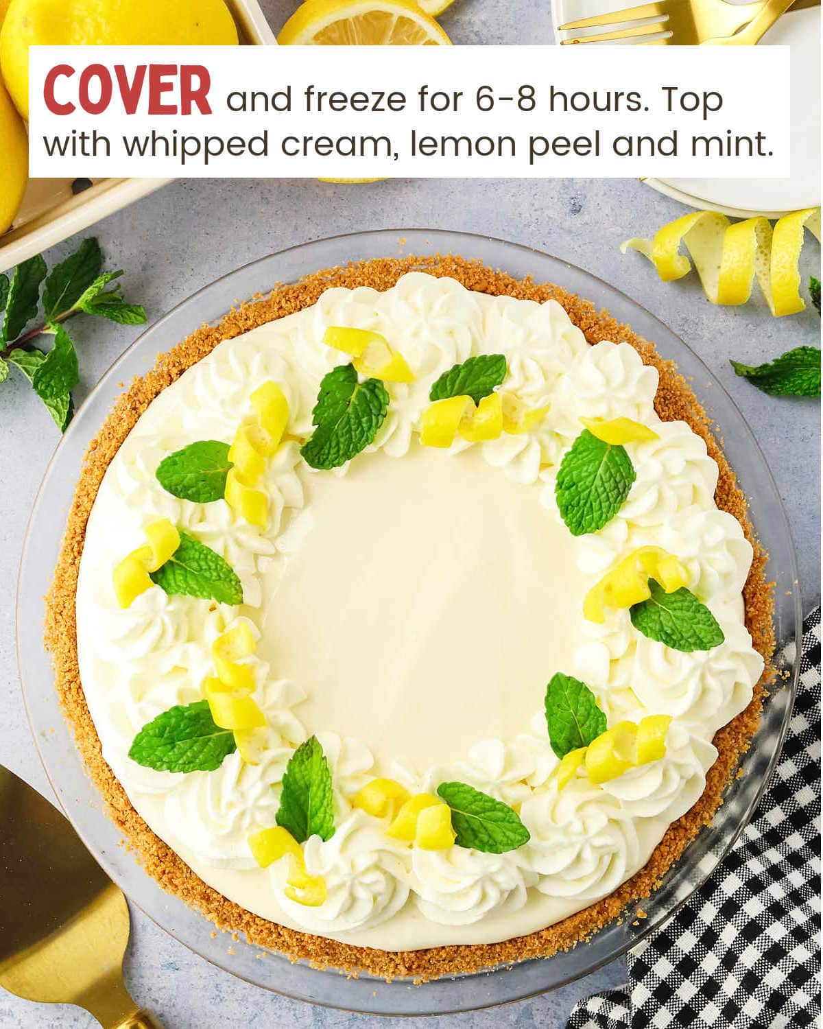 Finished Frozen Lemonade Pie garnished with lemon peel and mint leaves.