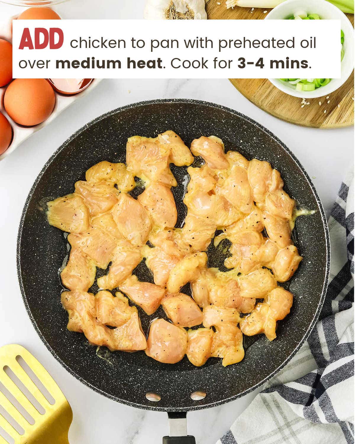 Cooking chicken in a skillet for Sesame Chicken.