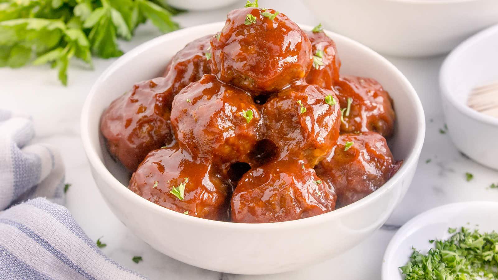 Crockpot BBQ Meatballs in a white bowl.