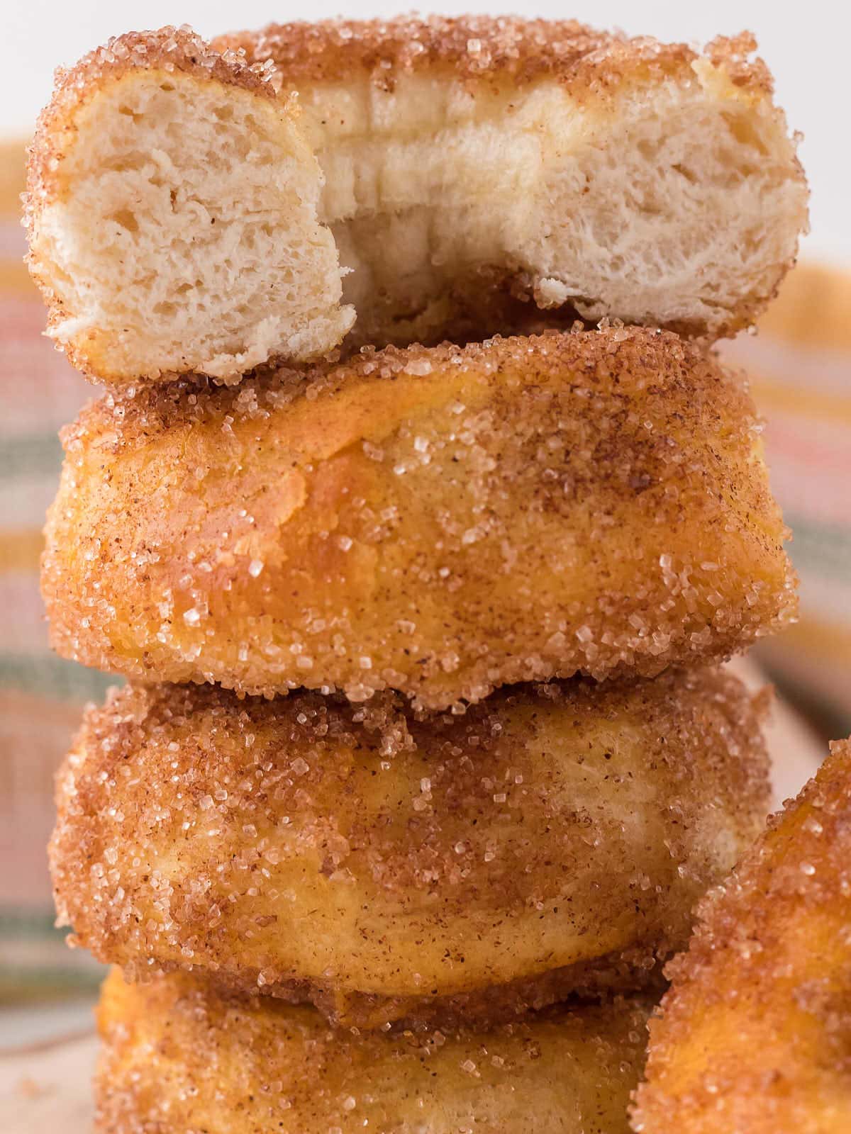 Stack of Air Fryer Cinnamon Donuts.