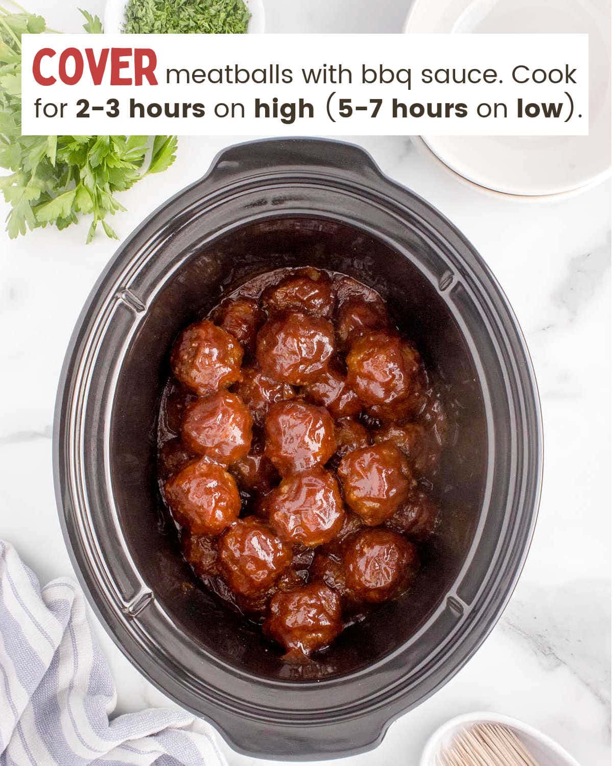 Meatballs with BBQ sauce in a slow cooker.