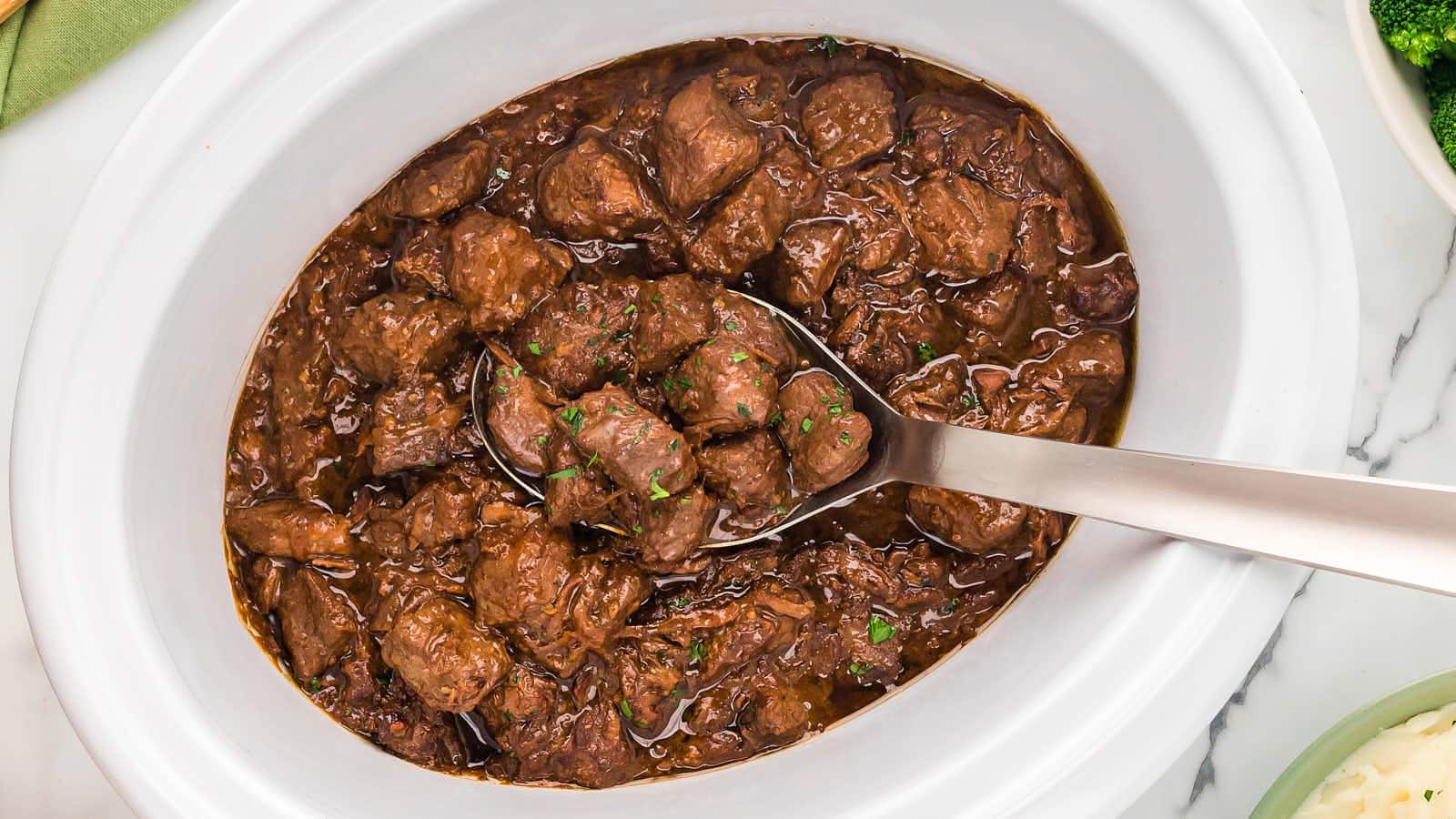 Crockpot Steak Bites recipe in a Cheerful Cook.