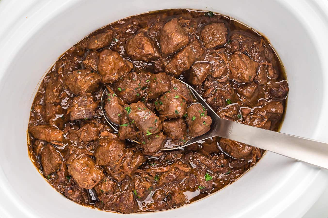 Crockpot Steak Bites recipe in a Cheerful Cook.