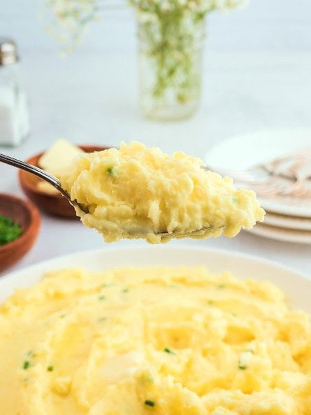 Closeup of a forkful of Sour Cream Mashed Potatoes.