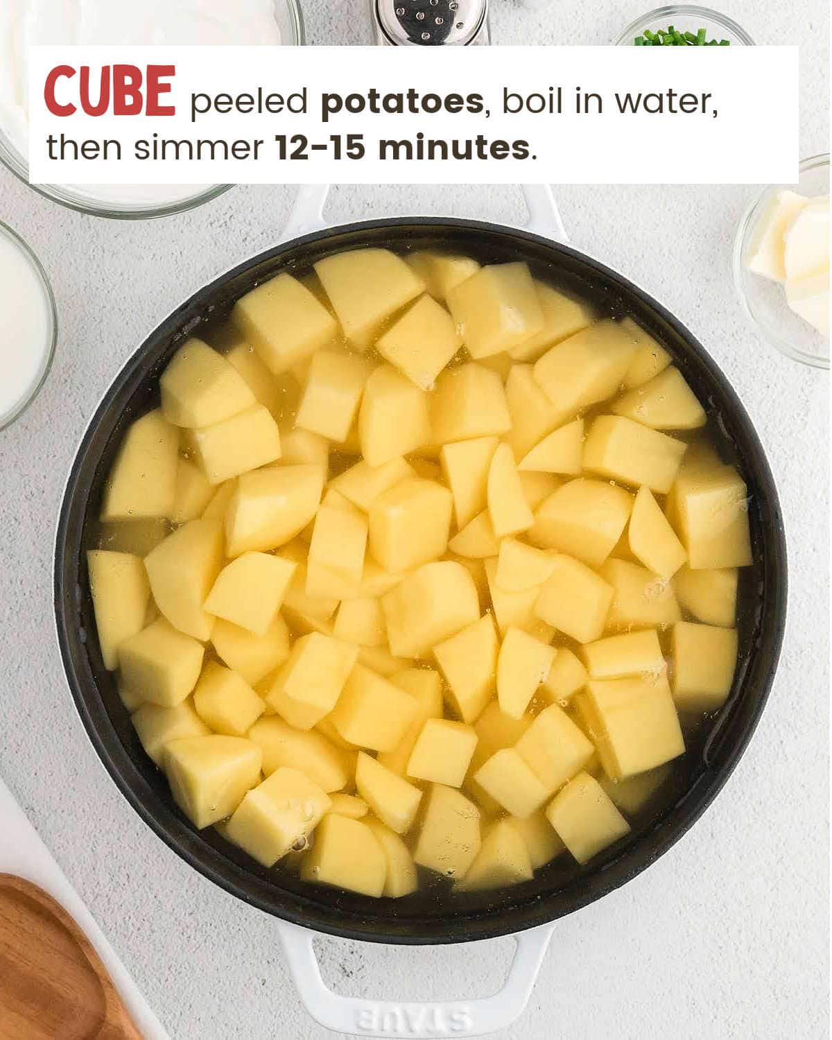 Peeled and cubed potatoes in pot of water for Sour Cream Mashed Potatoes.